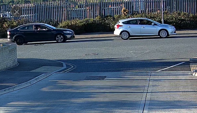 Silver Focus and Black Mondeo.jpg